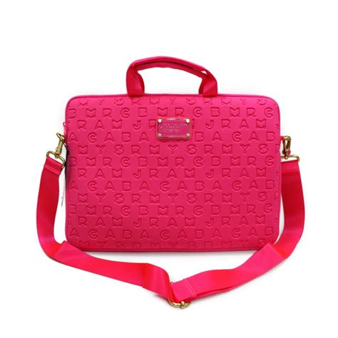 pink marc jacobs messenger bag.